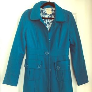 Striking turquoise wool coat